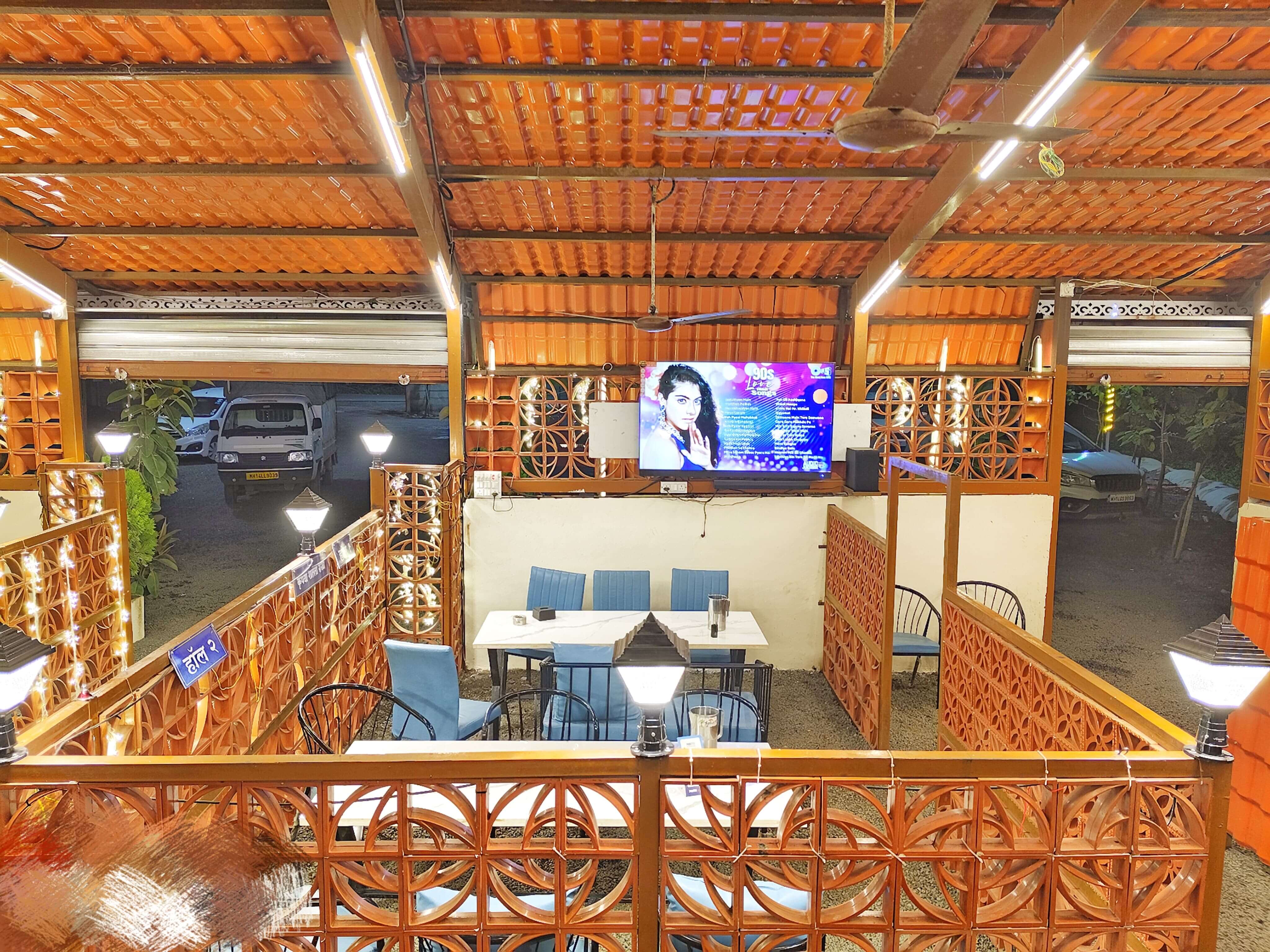 Evening dining area with TV entertainment